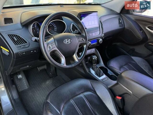 Сірий Хендай Туксон, об'ємом двигуна 2 л та пробігом 178 тис. км за 13800 $, фото 17 на Automoto.ua