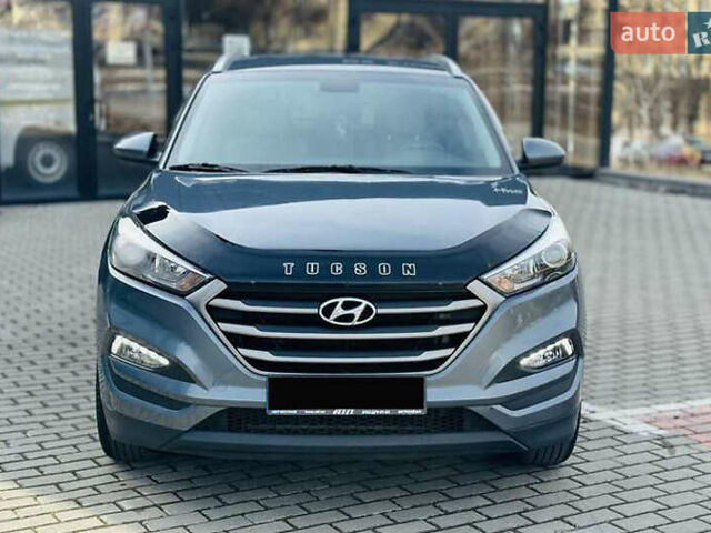 Серый Хендай Туксон, объемом двигателя 2 л и пробегом 79 тыс. км за 15500 $, фото 1 на Automoto.ua