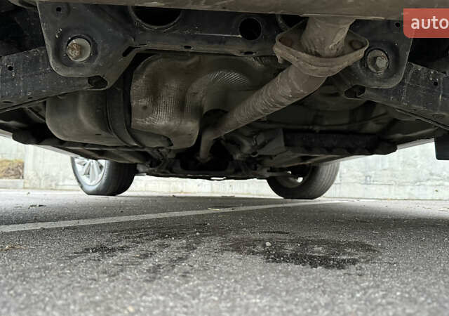 Серый Хендай Туксон, объемом двигателя 2 л и пробегом 203 тыс. км за 17700 $, фото 8 на Automoto.ua