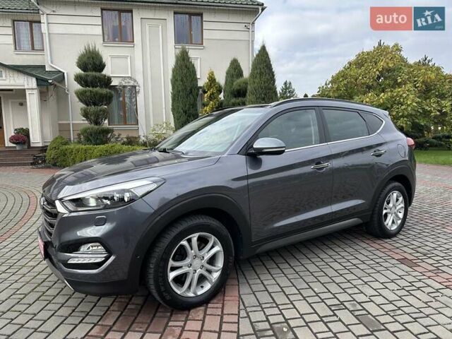 Серый Хендай Туксон, объемом двигателя 2 л и пробегом 130 тыс. км за 22500 $, фото 3 на Automoto.ua