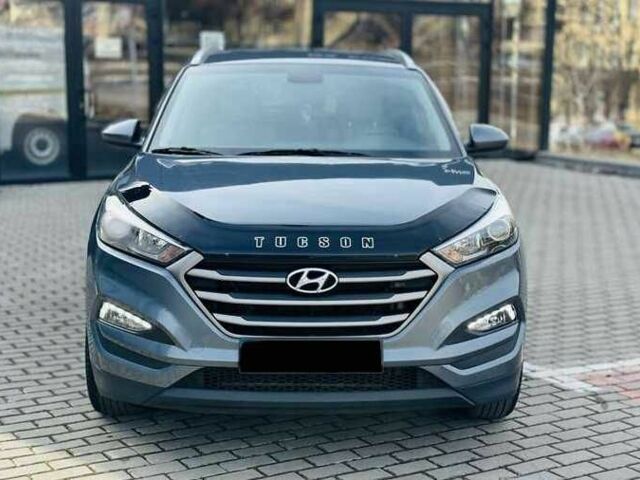 Серый Хендай Туксон, объемом двигателя 2 л и пробегом 79 тыс. км за 13500 $, фото 1 на Automoto.ua