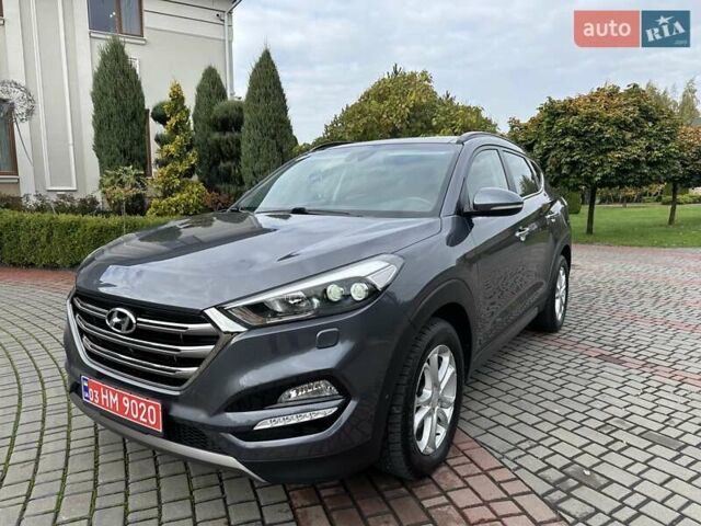 Серый Хендай Туксон, объемом двигателя 2 л и пробегом 130 тыс. км за 22500 $, фото 2 на Automoto.ua