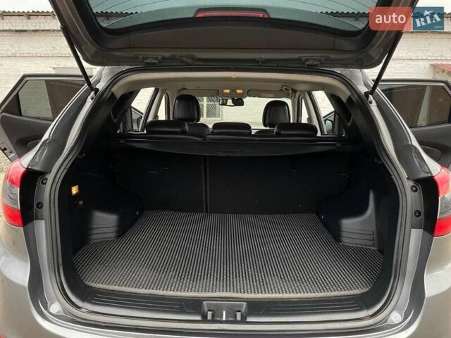 Серый Хендай Туксон, объемом двигателя 1.69 л и пробегом 293 тыс. км за 12950 $, фото 16 на Automoto.ua