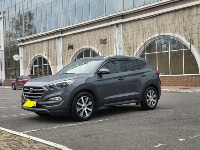 Серый Хендай Туксон, объемом двигателя 1.6 л и пробегом 113 тыс. км за 15000 $, фото 5 на Automoto.ua