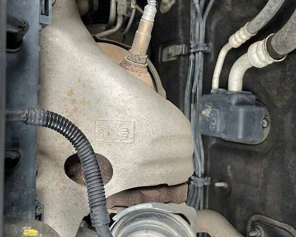 Серый Хендай Туксон, объемом двигателя 1.69 л и пробегом 293 тыс. км за 12950 $, фото 77 на Automoto.ua