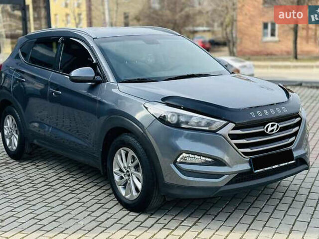 Серый Хендай Туксон, объемом двигателя 2 л и пробегом 79 тыс. км за 15500 $, фото 2 на Automoto.ua