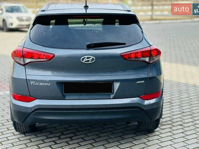 Серый Хендай Туксон, объемом двигателя 2 л и пробегом 79 тыс. км за 15500 $, фото 12 на Automoto.ua