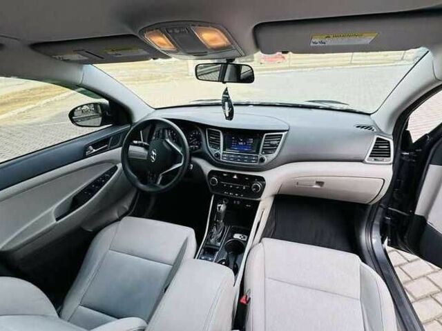 Серый Хендай Туксон, объемом двигателя 2 л и пробегом 79 тыс. км за 13500 $, фото 8 на Automoto.ua