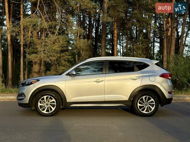 Серый Хендай Туксон, объемом двигателя 2 л и пробегом 58 тыс. км за 17500 $, фото 6 на Automoto.ua