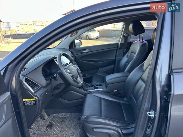 Серый Хендай Туксон, объемом двигателя 2 л и пробегом 124 тыс. км за 16900 $, фото 17 на Automoto.ua