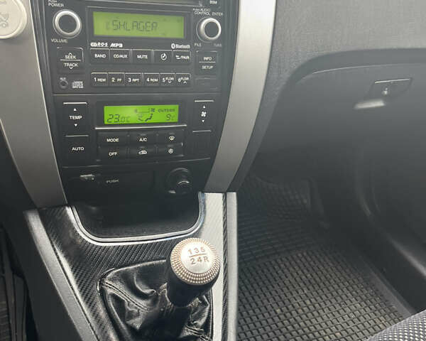 Серый Хендай Туксон, объемом двигателя 2 л и пробегом 192 тыс. км за 7777 $, фото 5 на Automoto.ua