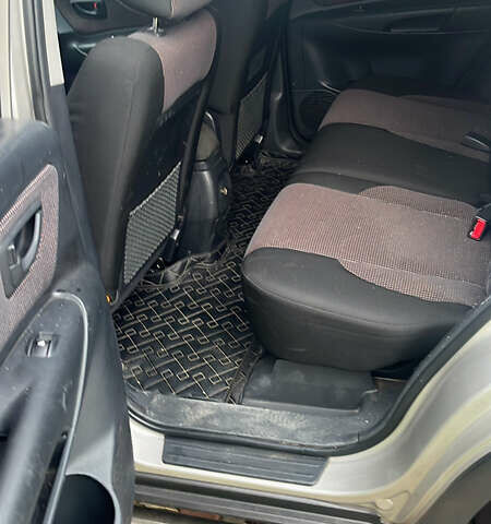 Серый Хендай Туксон, объемом двигателя 2 л и пробегом 192 тыс. км за 7777 $, фото 10 на Automoto.ua