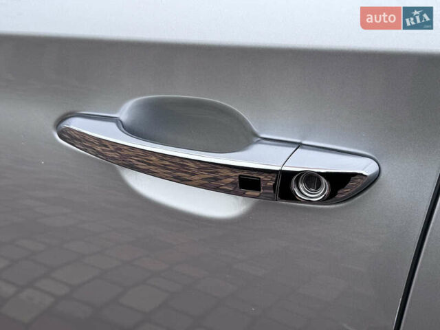 Серый Хендай Туксон, объемом двигателя 2 л и пробегом 85 тыс. км за 19500 $, фото 6 на Automoto.ua