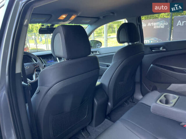 Сірий Хендай Туксон, об'ємом двигуна 2 л та пробігом 93 тис. км за 14300 $, фото 11 на Automoto.ua