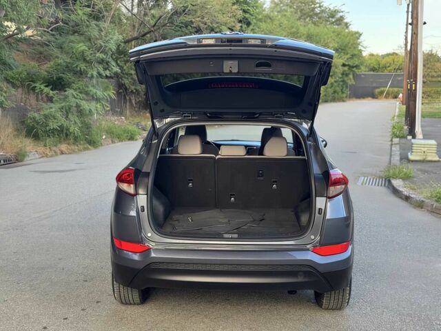 Сірий Хендай Туксон, об'ємом двигуна 2 л та пробігом 72 тис. км за 7599 $, фото 14 на Automoto.ua