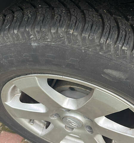 Серый Хендай Туксон, объемом двигателя 2 л и пробегом 192 тыс. км за 7777 $, фото 9 на Automoto.ua