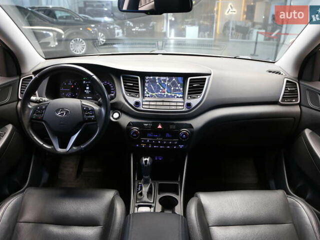 Серый Хендай Туксон, объемом двигателя 2 л и пробегом 126 тыс. км за 19400 $, фото 13 на Automoto.ua