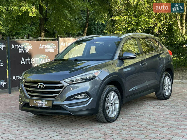 Сірий Хендай Туксон, об'ємом двигуна 2 л та пробігом 93 тис. км за 14300 $, фото 4 на Automoto.ua