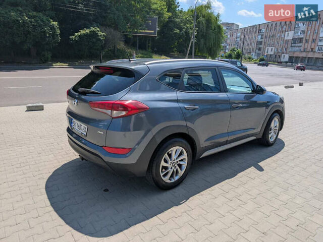 Сірий Хендай Туксон, об'ємом двигуна 1.98 л та пробігом 120 тис. км за 15500 $, фото 5 на Automoto.ua