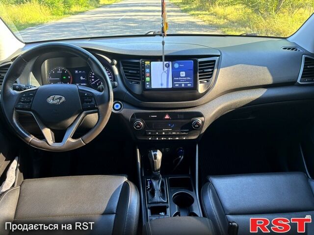 Сірий Хендай Туксон, об'ємом двигуна 2 л та пробігом 186 тис. км за 18200 $, фото 4 на Automoto.ua