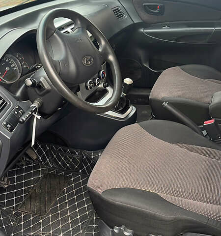 Серый Хендай Туксон, объемом двигателя 2 л и пробегом 192 тыс. км за 7777 $, фото 8 на Automoto.ua