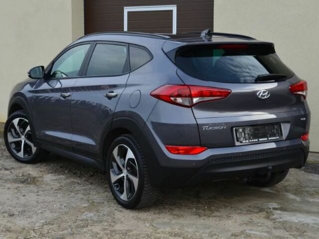 Серый Хендай Туксон, объемом двигателя 1.69 л и пробегом 165 тыс. км за 9600 $, фото 5 на Automoto.ua
