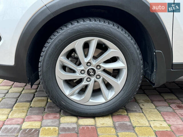 Серый Хендай Туксон, объемом двигателя 2 л и пробегом 85 тыс. км за 19500 $, фото 7 на Automoto.ua