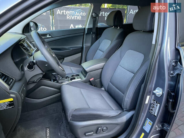 Сірий Хендай Туксон, об'ємом двигуна 2 л та пробігом 93 тис. км за 14300 $, фото 7 на Automoto.ua