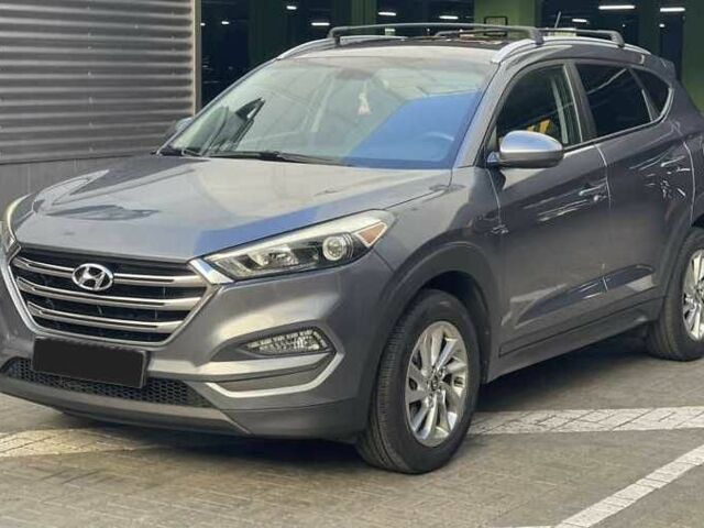 Сірий Хендай Туксон, об'ємом двигуна 2 л та пробігом 125 тис. км за 13600 $, фото 4 на Automoto.ua