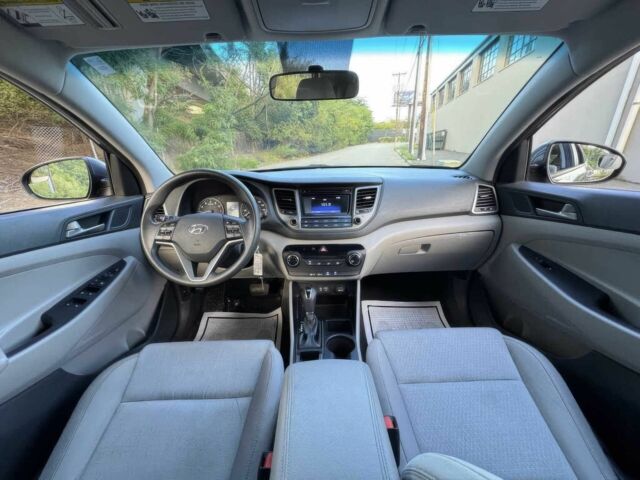 Сірий Хендай Туксон, об'ємом двигуна 2 л та пробігом 77 тис. км за 13300 $, фото 10 на Automoto.ua