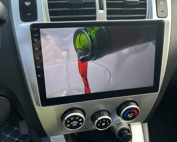 Серый Хендай Туксон, объемом двигателя 2 л и пробегом 192 тыс. км за 7777 $, фото 13 на Automoto.ua