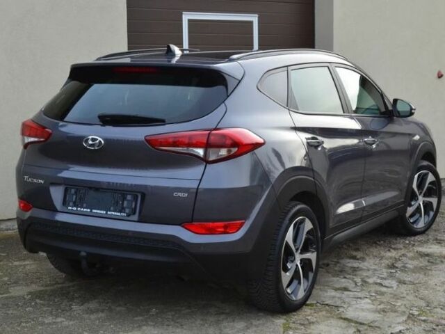 Серый Хендай Туксон, объемом двигателя 1.69 л и пробегом 165 тыс. км за 9600 $, фото 3 на Automoto.ua