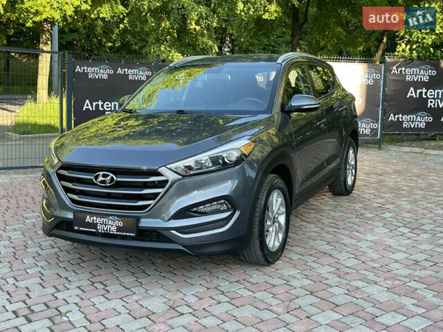 Сірий Хендай Туксон, об'ємом двигуна 2 л та пробігом 93 тис. км за 14300 $, фото 1 на Automoto.ua