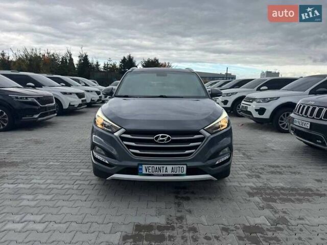 Серый Хендай Туксон, объемом двигателя 2 л и пробегом 191 тыс. км за 19500 $, фото 2 на Automoto.ua