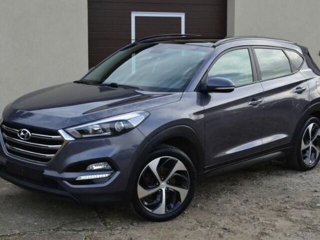 Серый Хендай Туксон, объемом двигателя 1.69 л и пробегом 165 тыс. км за 9600 $, фото 2 на Automoto.ua