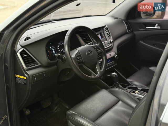 Сірий Хендай Туксон, об'ємом двигуна 1.69 л та пробігом 130 тис. км за 16800 $, фото 7 на Automoto.ua