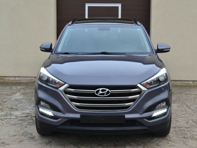 Серый Хендай Туксон, объемом двигателя 1.69 л и пробегом 165 тыс. км за 9600 $, фото 1 на Automoto.ua