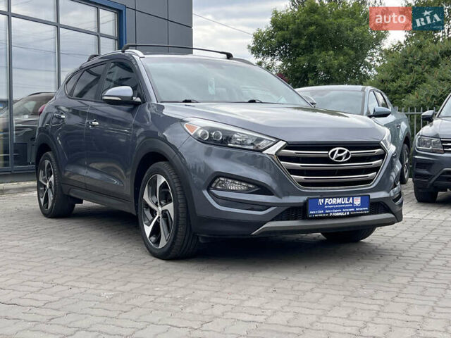 Серый Хендай Туксон, объемом двигателя 1.6 л и пробегом 188 тыс. км за 15990 $, фото 3 на Automoto.ua