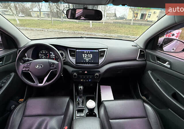 Сірий Хендай Туксон, об'ємом двигуна 2 л та пробігом 206 тис. км за 16000 $, фото 10 на Automoto.ua