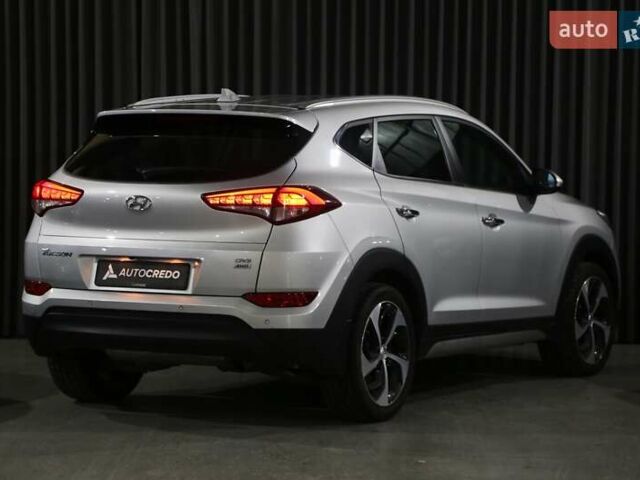Серый Хендай Туксон, объемом двигателя 2 л и пробегом 126 тыс. км за 19400 $, фото 6 на Automoto.ua
