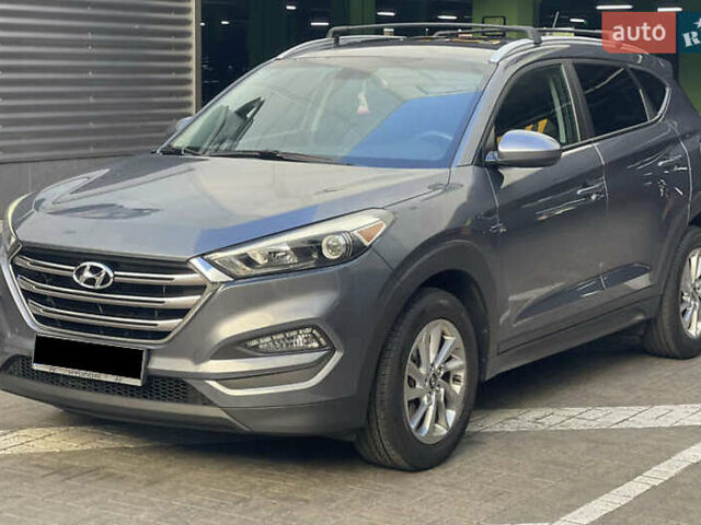 Серый Хендай Туксон, объемом двигателя 2 л и пробегом 125 тыс. км за 15600 $, фото 4 на Automoto.ua