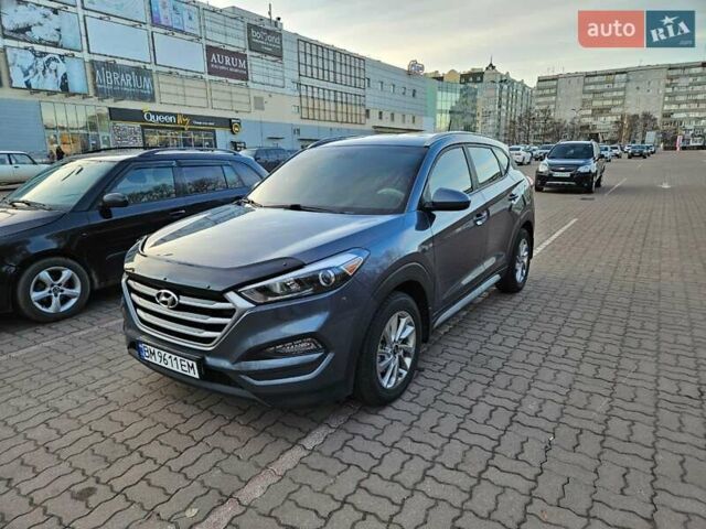Серый Хендай Туксон, объемом двигателя 2 л и пробегом 134 тыс. км за 14600 $, фото 2 на Automoto.ua