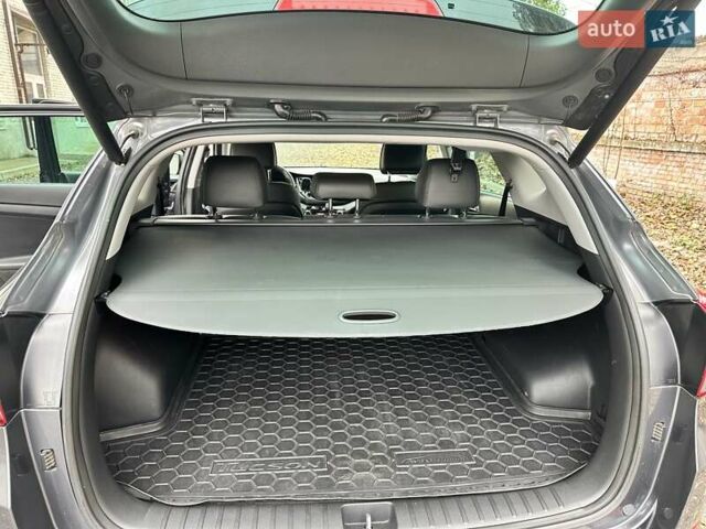 Серый Хендай Туксон, объемом двигателя 2 л и пробегом 140 тыс. км за 18200 $, фото 12 на Automoto.ua