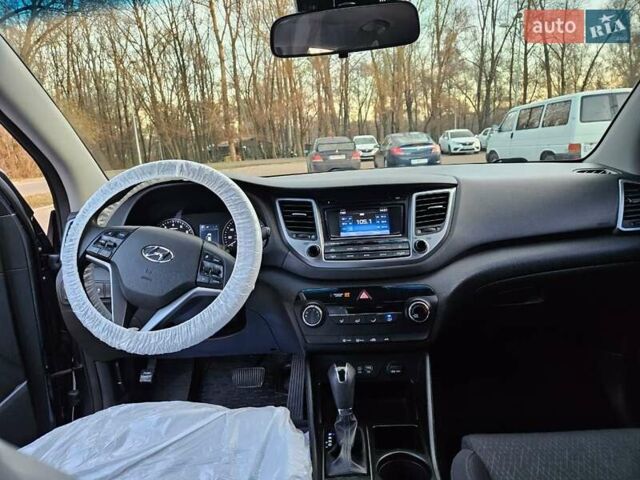 Серый Хендай Туксон, объемом двигателя 2 л и пробегом 134 тыс. км за 14600 $, фото 9 на Automoto.ua