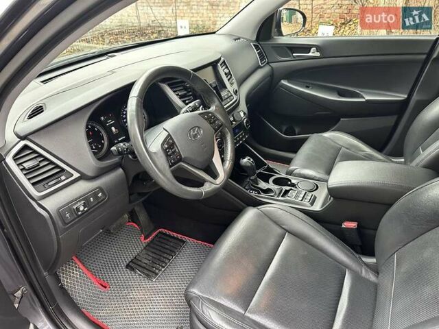 Серый Хендай Туксон, объемом двигателя 2 л и пробегом 140 тыс. км за 18200 $, фото 8 на Automoto.ua