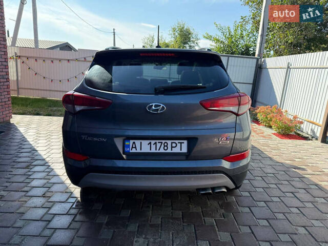Сірий Хендай Туксон, об'ємом двигуна 1.59 л та пробігом 125 тис. км за 17000 $, фото 3 на Automoto.ua