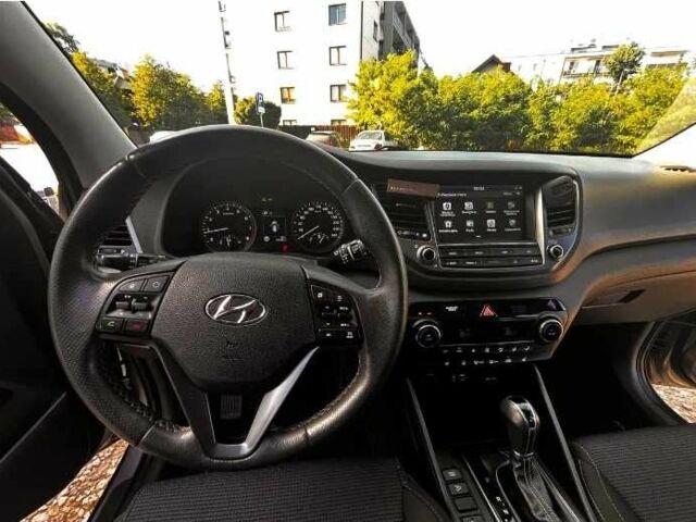 Серый Хендай Туксон, объемом двигателя 2.4 л и пробегом 94 тыс. км за 10700 $, фото 11 на Automoto.ua