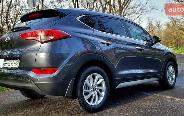 Серый Хендай Туксон, объемом двигателя 2 л и пробегом 19 тыс. км за 25000 $, фото 14 на Automoto.ua
