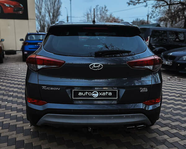 Сірий Хендай Туксон, об'ємом двигуна 1.6 л та пробігом 133 тис. км за 19000 $, фото 5 на Automoto.ua