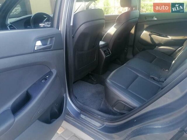 Серый Хендай Туксон, объемом двигателя 1.59 л и пробегом 80 тыс. км за 19000 $, фото 9 на Automoto.ua